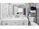 Bathroom with a dual sink vanity, a large mirror, and ample counter space at 250 Daileys Plantation Dr, Mcdonough, GA 30253