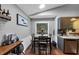 Cozy dining area with a view, perfect for casual meals and gatherings at 250 Daileys Plantation Dr, Mcdonough, GA 30253