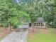 Charming single-Gathering home featuring a covered front porch, attached garage, and well-maintained lawn at 250 Daileys Plantation Dr, Mcdonough, GA 30253