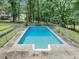 Swimming pool with a geometric design, ideal for cooling off during hot summer days at 250 Daileys Plantation Dr, Mcdonough, GA 30253