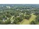 Aerial view of the neighborhood and nearby golf course at 705 Clubhouse Se Dr, Conyers, GA 30094
