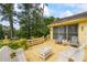 Inviting back deck offers a pleasant view and plenty of room for seating at 705 Clubhouse Se Dr, Conyers, GA 30094
