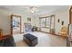 Bedroom with a bookcase and a window showcasing an exterior view of the home at 705 Clubhouse Se Dr, Conyers, GA 30094