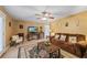 Spacious living room with plush seating, decorative accents, TV, and a fireplace at 705 Clubhouse Se Dr, Conyers, GA 30094