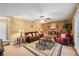 Comfortable living room featuring a fireplace, decorative rug, comfortable seating, and neutral color palette at 705 Clubhouse Se Dr, Conyers, GA 30094