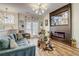 Bright living room featuring modern lighting, stylish furniture, and a sleek fireplace at 1753 Liberty Pkwy, Atlanta, GA 30318