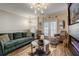 Spacious living room with contemporary decor, comfortable seating, and ample natural light at 1753 Liberty Pkwy, Atlanta, GA 30318