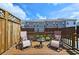 Relaxing back porch with patio furniture and a wood fence at 4107 Township Pkwy # 69, Sandy Springs, GA 30342