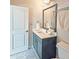 Charming bathroom with a modern sink, framed mirror, and fixtures at 4107 Township Pkwy # 69, Sandy Springs, GA 30342