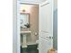 Bathroom with a pedestal sink, tile floor and lighting at 4107 Township Pkwy # 69, Sandy Springs, GA 30342