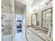 Bright bathroom featuring a double vanity, a walk-in shower, and luxury finishes at 4107 Township Pkwy # 69, Sandy Springs, GA 30342