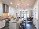 Modern kitchen with stainless steel appliances, granite countertops, and an island with seating at 4107 Township Pkwy # 69, Sandy Springs, GA 30342