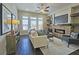 Cozy living room with brick fireplace, tv and comfortable furniture at 4107 Township Pkwy # 69, Sandy Springs, GA 30342
