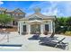 Charming pool house with lounge chairs and manicured landscaping at 4107 Township Pkwy # 69, Sandy Springs, GA 30342