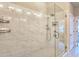 Walk-in shower featuring luxurious tile work, a shower head, and modern fixtures at 4107 Township Pkwy # 69, Sandy Springs, GA 30342