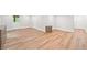 Spacious bedroom featuring hardwood flooring, and ample natural light at 6900 Driskell Cir, Cumming, GA 30041