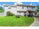 Manicured backyard with a patio, gazebo, and ample green space perfect for outdoor entertainment at 10 Callaway Ct, Hiram, GA 30141