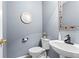 Charming powder room features stylish fixtures, a decorative mirror, and fresh neutral paint at 10 Callaway Ct, Hiram, GA 30141