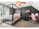 Bedroom with a ceiling fan, neon decor, and lots of natural light at 10 Callaway Ct, Hiram, GA 30141