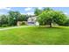 Well-maintained home with a spacious front yard and mature trees, offering curb appeal at 10 Callaway Ct, Hiram, GA 30141