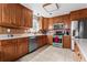 Well-equipped kitchen boasts stainless steel appliances, including a modern microwave, oven, and dishwasher at 10 Callaway Ct, Hiram, GA 30141