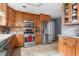 Updated kitchen showcasing stainless steel appliances and plentiful cabinet space for all your culinary needs at 10 Callaway Ct, Hiram, GA 30141