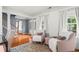 Elegant living room showcasing stylish furniture, hardwood floors, and abundant natural light at 10 Callaway Ct, Hiram, GA 30141
