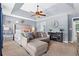 Elegant main bedroom has a spacious layout, sitting area, and stylish decor for ultimate comfort at 10 Callaway Ct, Hiram, GA 30141