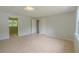 Spacious basement with tile flooring, and a window and multiple closets/rooms at 3781 Deercreek Dr, Powder Springs, GA 30127