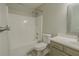 Bathroom featuring a shower-tub, sink with vanity and neutral wall color at 3781 Deercreek Dr, Powder Springs, GA 30127
