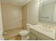 Clean and tidy bathroom featuring a tiled walk-in shower and a vanity with a mirror at 3781 Deercreek Dr, Powder Springs, GA 30127