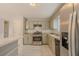 Kitchen featuring stainless steel appliances, light wood cabinets, and tile flooring at 3781 Deercreek Dr, Powder Springs, GA 30127