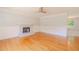 Spacious living room featuring hardwood floors, paneled walls, and a marble fireplace at 3781 Deercreek Dr, Powder Springs, GA 30127