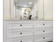 Bathroom vanity with double sinks, marble countertops, and modern fixtures at 4178 Castle Pines Ct, Tucker, GA 30084