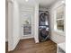 Laundry area features stacked washer/dryer and a window at 4178 Castle Pines Ct, Tucker, GA 30084