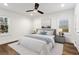 Cozy bedroom with natural light, hardwood floors, and neutral decor, creating a relaxing atmosphere at 4178 Castle Pines Ct, Tucker, GA 30084
