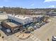 Aerial view highlighting shops and restaurants along the street, with convenient parking and charming curb appeal at 4178 Castle Pines Ct, Tucker, GA 30084
