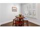 Cozy breakfast nook features a round table, seating for three, and bright windows at 18 Peachtree Ne Ave # 5, Atlanta, GA 30305