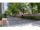 Gated community entrance with a brick driveway and number signage at 18 Peachtree Ne Ave # 5, Atlanta, GA 30305