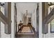 Inviting entryway with staircase and view of the wine cellar at 18 Peachtree Ne Ave # 5, Atlanta, GA 30305