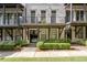 Multi-story townhome with brick facade and private balconies at 18 Peachtree Ne Ave # 5, Atlanta, GA 30305
