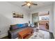 Comfortable living room area with dark hardwood floors, a plush couch, and a patio at 18 Peachtree Ne Ave # 5, Atlanta, GA 30305