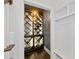 Elegant wine cellar with diamond-patterned shelving and ambient lighting at 18 Peachtree Ne Ave # 5, Atlanta, GA 30305