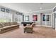 Basement space with a sitting area, an air hockey table, and sports memorabilia on display at 2845 Aquitania Ln, Cumming, GA 30040