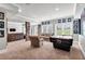 Basement featuring an air hockey table and a seating area with neutral decor at 2845 Aquitania Ln, Cumming, GA 30040