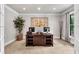 Bright home office featuring neutral carpet, wainscoting and a view of outside at 2845 Aquitania Ln, Cumming, GA 30040