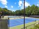 Beautiful community tennis courts offer a recreational space for residents at 2845 Aquitania Ln, Cumming, GA 30040