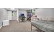 Finished basement offers a bedroom with carpet floors, closet, and a window at 684 Doe Lane Ln, Loganville, GA 30052