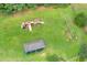 Aerial view of community playground with swings, slides, and covered picnic area at 684 Doe Lane Ln, Loganville, GA 30052