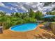 Above ground pool with wooden deck and privacy fence at 684 Doe Lane Ln, Loganville, GA 30052